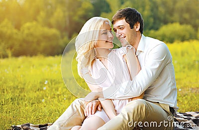 Happy pretty couple in love having fun outdoors Stock Photo