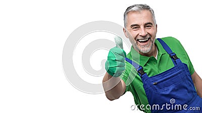 Happy professional gardener giving a thumbs up Stock Photo