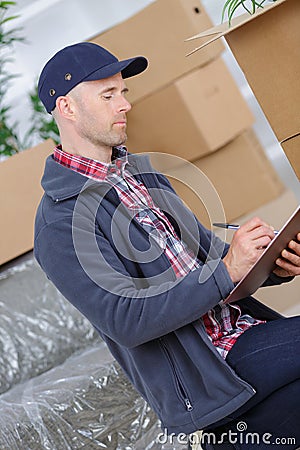 Happy professional shipping courier delivery postal service Stock Photo