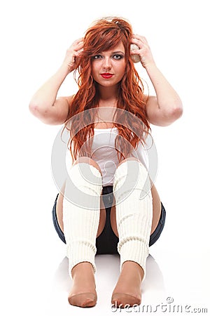 Happy redhairy woman girl in white headphones Stock Photo