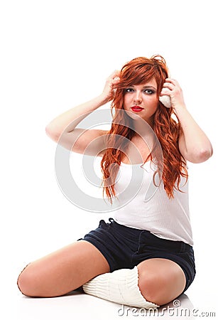 Happy redhairy woman girl in white headphones Stock Photo