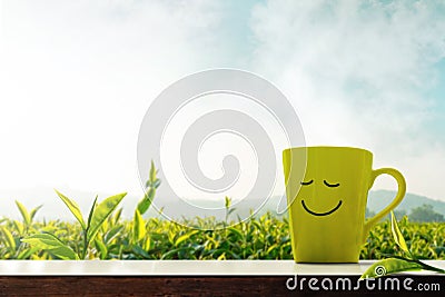 Happy and Relaxation Concept. A Cup of Hot Tea with Smiley Face Stock Photo