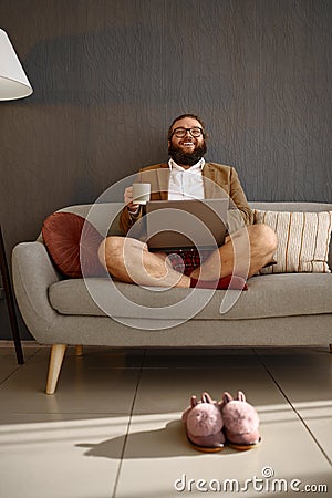 Happy relaxed businessman freelancer take coffee break Stock Photo