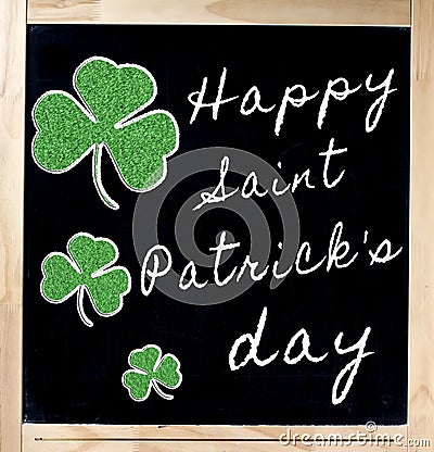 Happy Saint Patrick s Day on Blackboard Stock Photo