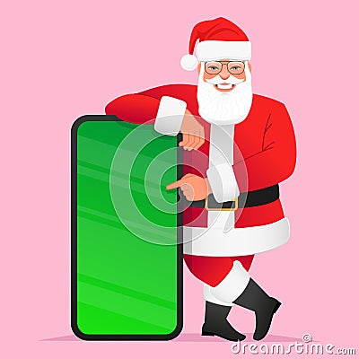 Happy Santa Claus with glasses is standing next to a large smartphone with a chroma key. Cartoon Santa points to the mobile phone Vector Illustration