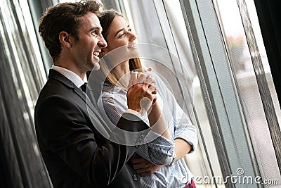 Happy satisfied couple looking and planning their future, vision Stock Photo