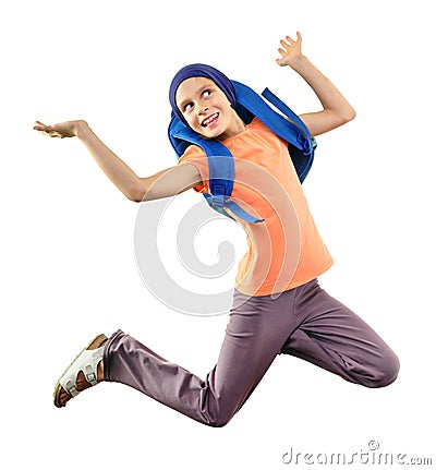 Happy schoolchild or traveler exercising and jumping Stock Photo