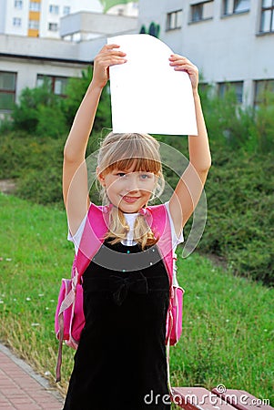 Happy schoolgirl with graduation certificate Stock Photo