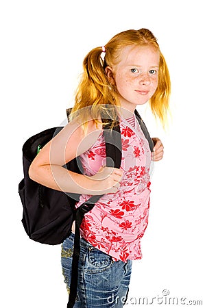 Happy schoolgirl ready to go to school Stock Photo