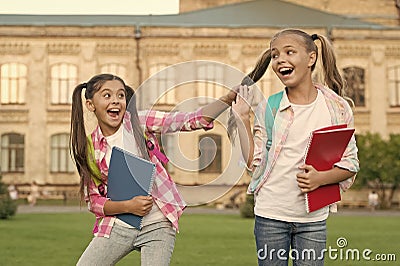 Happy schoolmates. School camp. Modern education. Teens with backpacks. Girls school background. STEM summer camps and Stock Photo