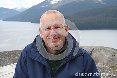 Happy Senior in Alaska Stock Photo