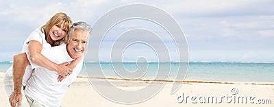 Happy senior couple on the beach. Stock Photo