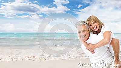 Happy senior couple on the beach. Stock Photo