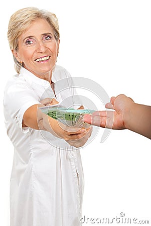 Happy senior giving money Stock Photo