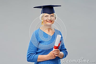 Happy senior graduate student woman with diploma Stock Photo