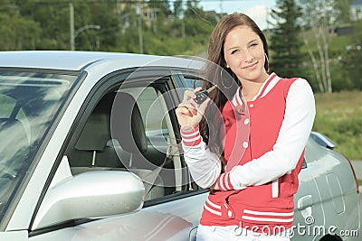 Happy showing car keys Stock Photo