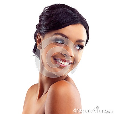 Happy and it shows Shes radiantly beautiful. Studio shot of a young woman with perfect skin posing against a white Stock Photo