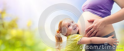 Happy Sister Hugging Pregnant Mother Stock Photo