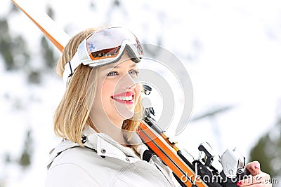 Happy skier looking at the snowy mountain Stock Photo