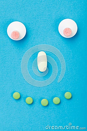 Happy smileyface made of pills Stock Photo