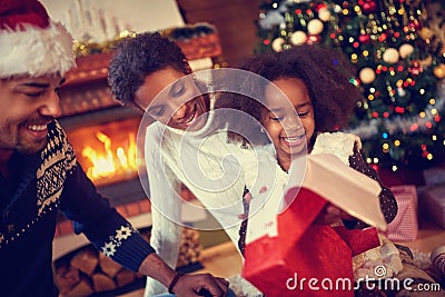 Happy smiling African American family in Christmas atmosphere Stock Photo