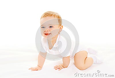 Happy smiling baby crawls on white background Stock Photo