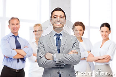 Happy smiling business team over office room Stock Photo