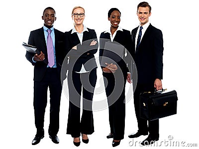 Happy smiling business team standing in a row Stock Photo