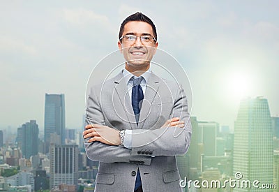 Happy smiling businessman in eyeglasses and suit Stock Photo