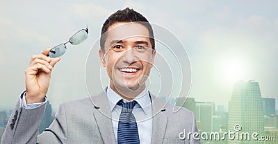 Happy smiling businessman in eyeglasses and suit Stock Photo