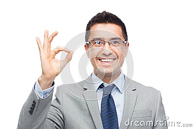 Happy smiling businessman in eyeglasses and suit Stock Photo