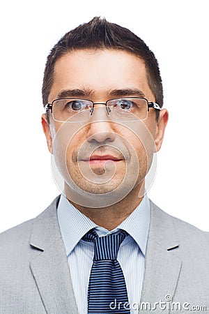 Happy smiling businessman in eyeglasses and suit Stock Photo