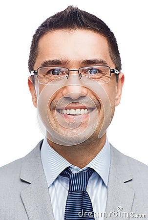 Happy smiling businessman in eyeglasses and suit Stock Photo