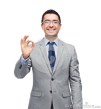 Happy smiling businessman in eyeglasses and suit Stock Photo