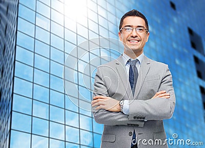 Happy smiling businessman in eyeglasses and suit Stock Photo