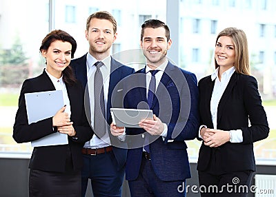Happy smiling businessteam in office Stock Photo