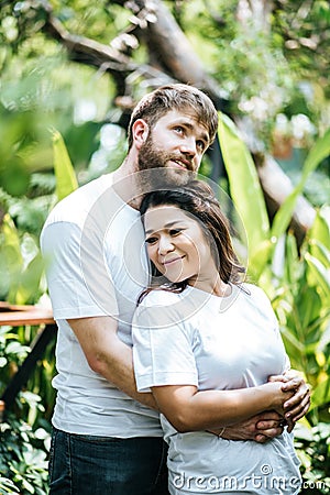 Happy Smiling Couple diversity in love moment Stock Photo