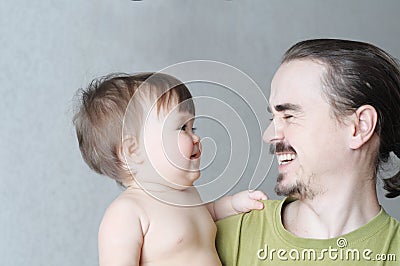 Happy smiling father and baby daughter portrait. Happiness in simple lifestyle Stock Photo