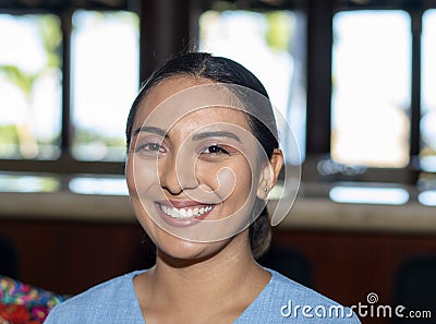 Happy, Smiling, Friendly & Beautiful Mexican Woman Working in a Resort Hotel Mexico Stock Photo