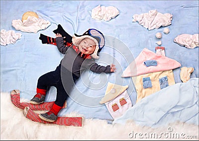 Happy smiling infant baby boy skier Stock Photo