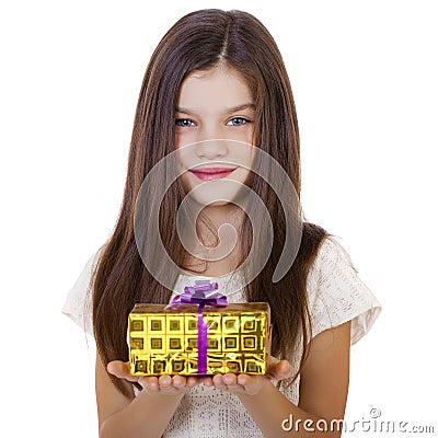 Happy smiling little girl holding and offering a gift for Christ Stock Photo