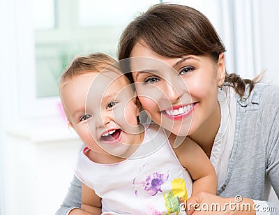 Happy Smiling Mother and Baby Stock Photo