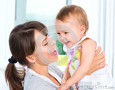 Happy Smiling Mother and Baby Stock Photo