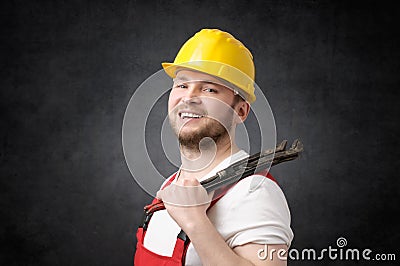 Happy, smiling plumber Stock Photo