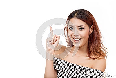 Happy, smiling, positive, woman pointing up at blank space Stock Photo