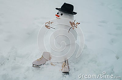 Happy smiling snow man on sunny winter day. Snowmen. Snowman. Happy funny snowman in the snow. Greeting snowman. Stock Photo