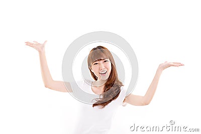 Happy, smiling woman raising her both hands, showing something Stock Photo