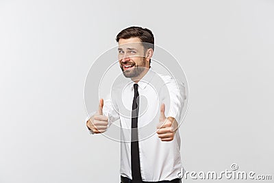 Happy smiling young business man with thumbs up gesture, isolated over white background Stock Photo