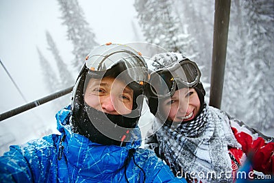 Happy snowboarders Stock Photo