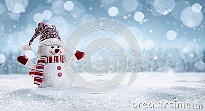 Happy snowman in winter secenery Stock Photo